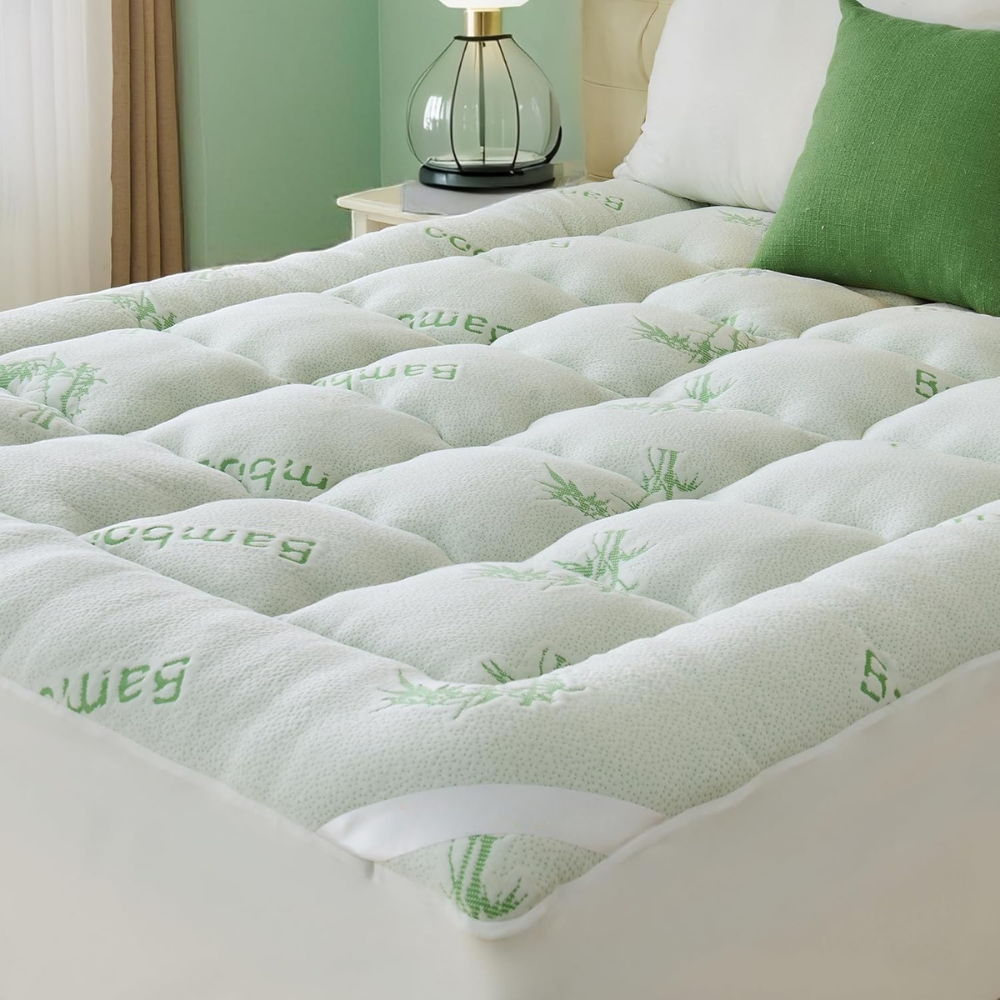 Quilted waterproof mattress cover with elasticated fitted edge