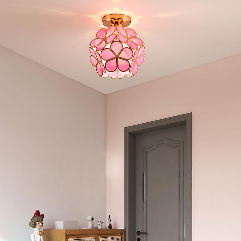 Floral ceiling light with a rounded decorative petal shade
