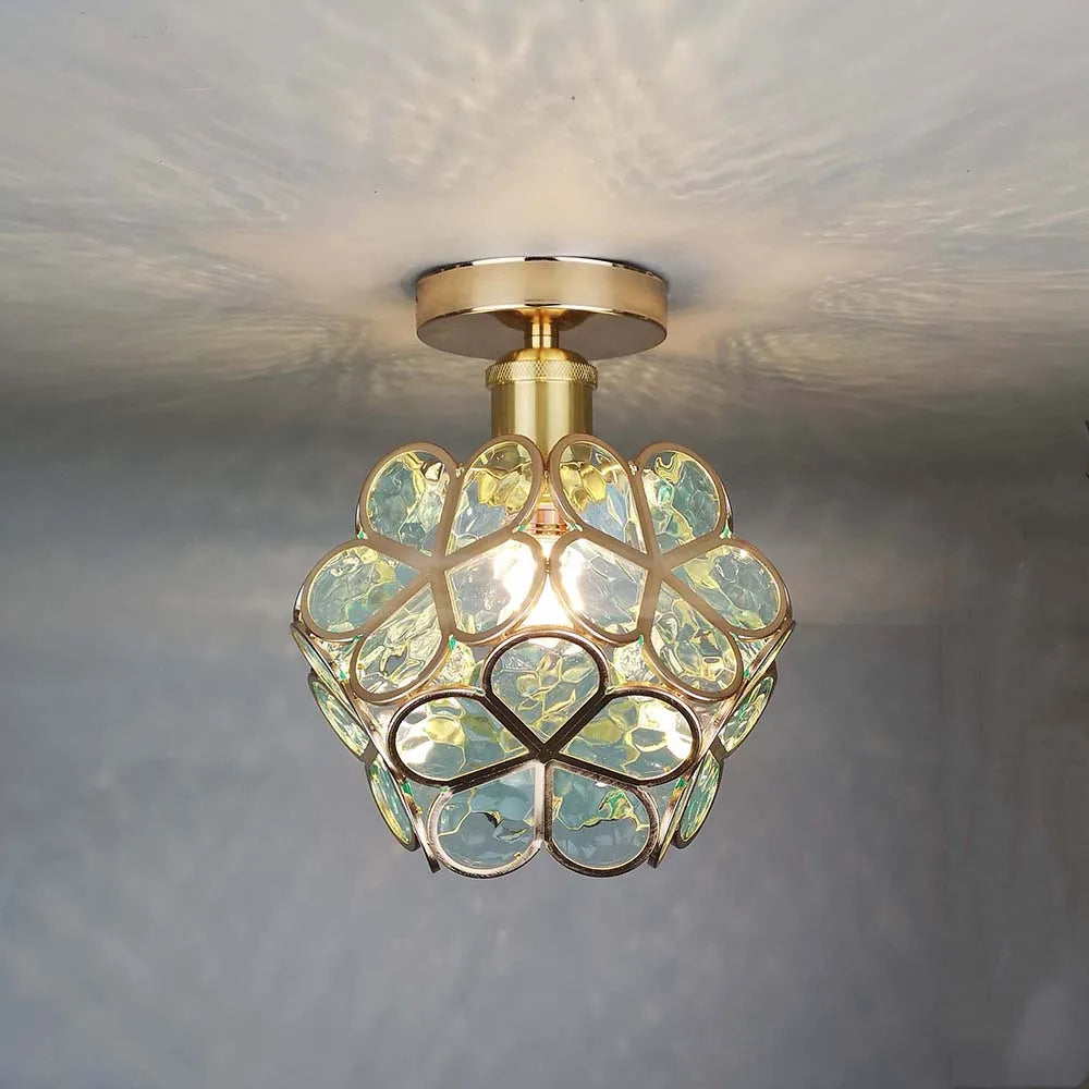 Floral ceiling light with a rounded decorative petal shade