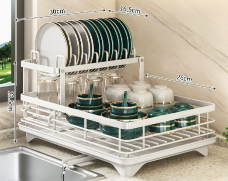 Double-layer foldable dish drying rack beside a kitchen sink