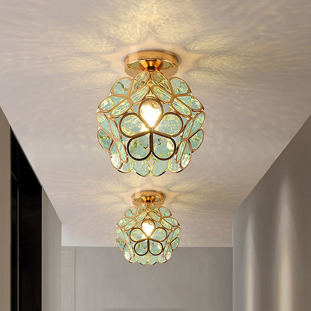 Floral ceiling light with a rounded decorative petal shade
