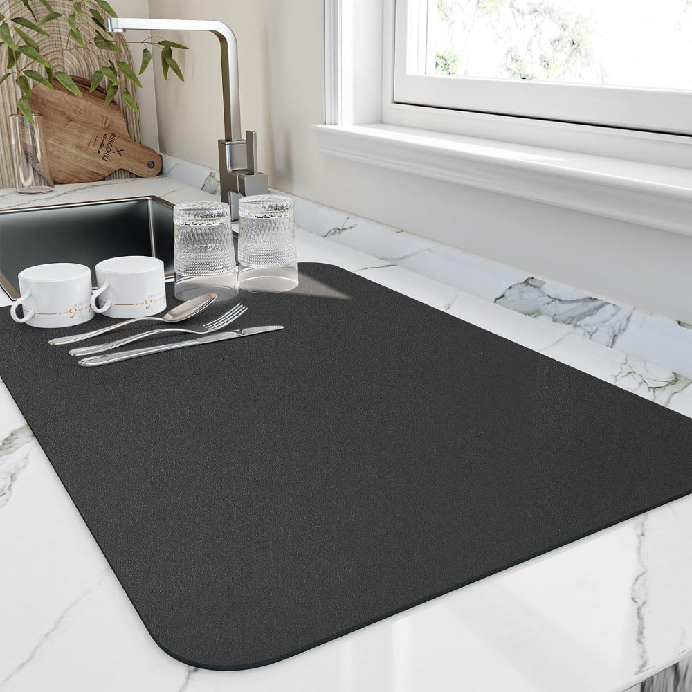 Rectangular textured kitchen mat with rounded corners and dark edging