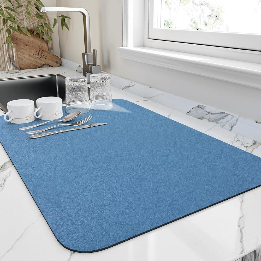 Rectangular textured kitchen mat with rounded corners and dark edging