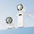 Handheld portable fan with circular fan head, digital display and wrist strap