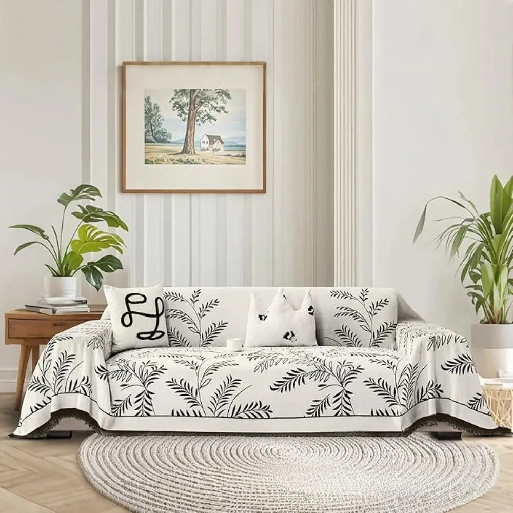 Chenille jacquard sofa cover with botanical leaf pattern and fringed edge