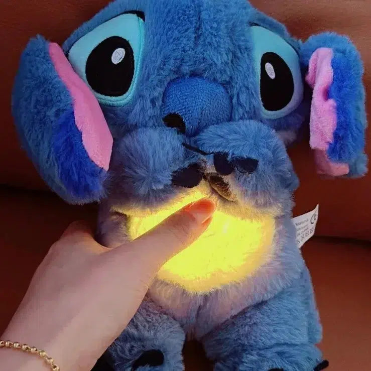 Character plush toy with large ears and illuminated belly