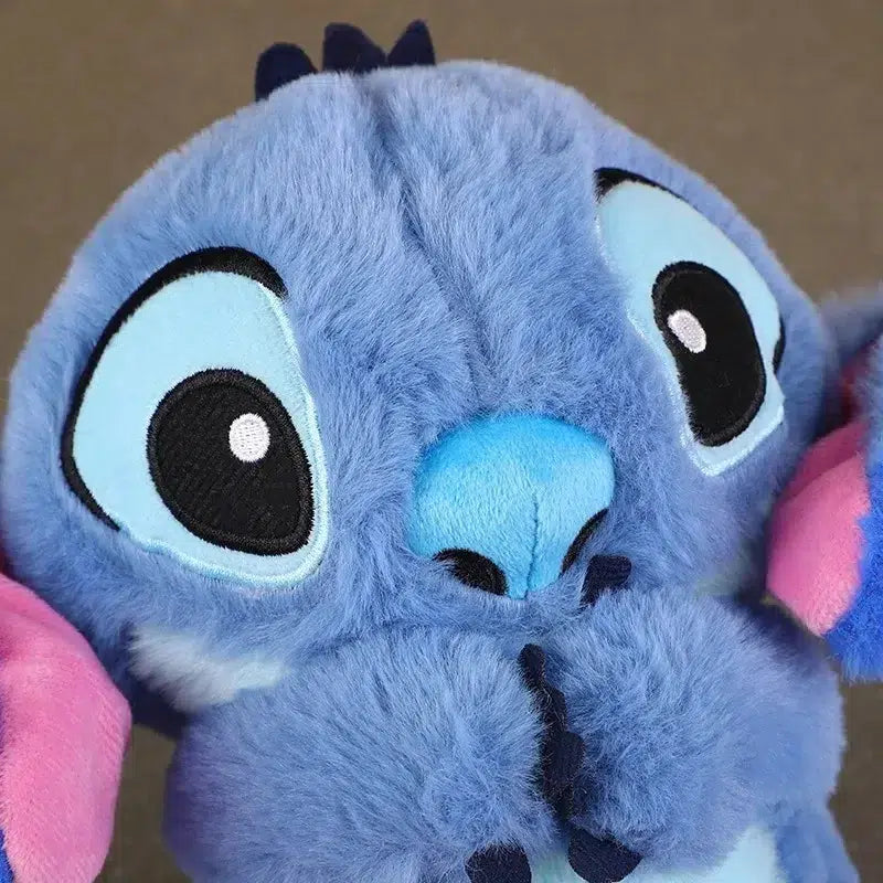 Character plush toy with large ears and illuminated belly