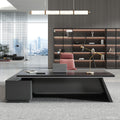 Dark L-shaped executive desk with wood-effect worktop and integrated side cabinet