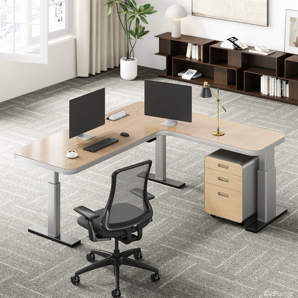 L-shaped natural wood-effect sit-stand office desk with power hub and mobile three-drawer cabinet