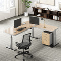 L-shaped natural wood-effect sit-stand office desk with power hub and mobile three-drawer cabinet