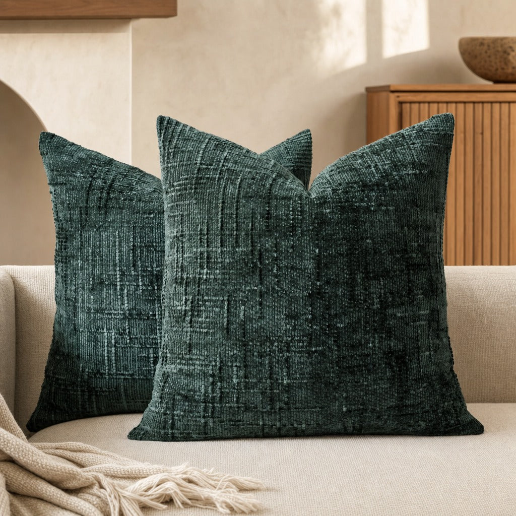 Textured geometric throw pillow with a woven chenille-style finish