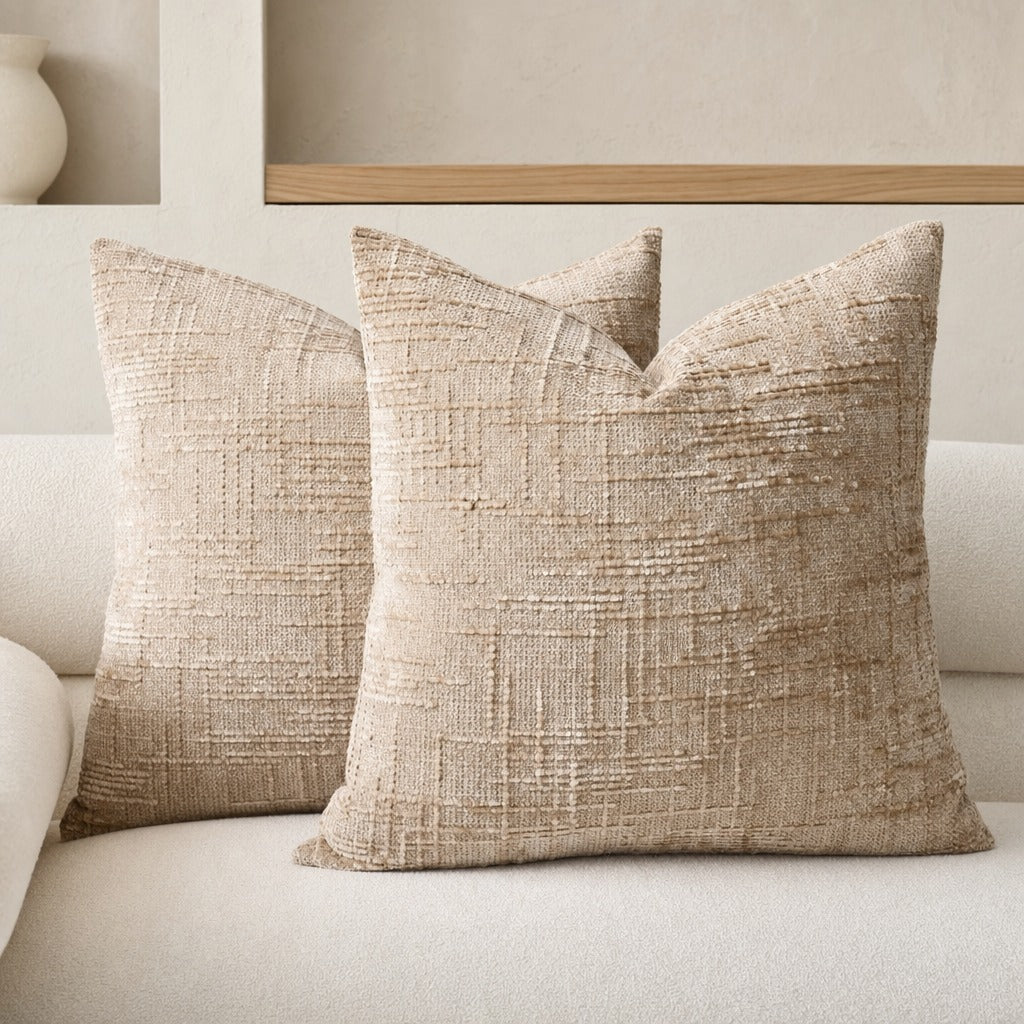 Textured geometric throw pillow with a woven chenille-style finish