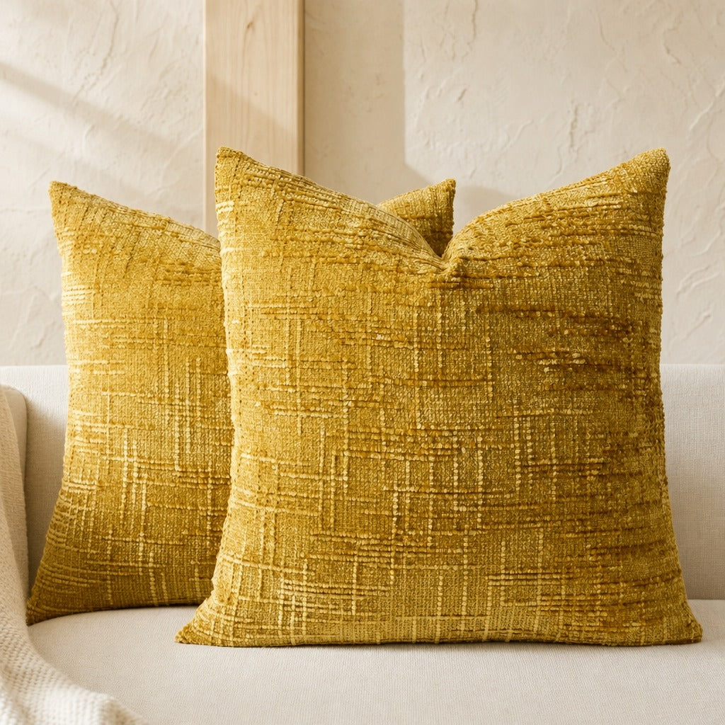 Textured geometric throw pillow with a woven chenille-style finish