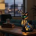 Illuminated cat table lamp with a stained glass style geometric mosaic design