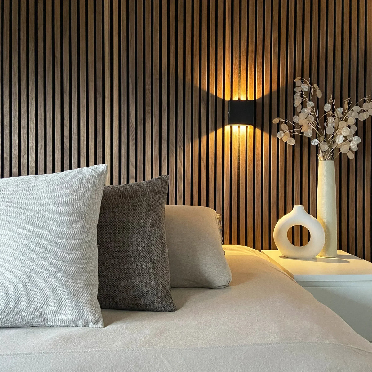 Geometric LED wall light projecting light upwards and downwards