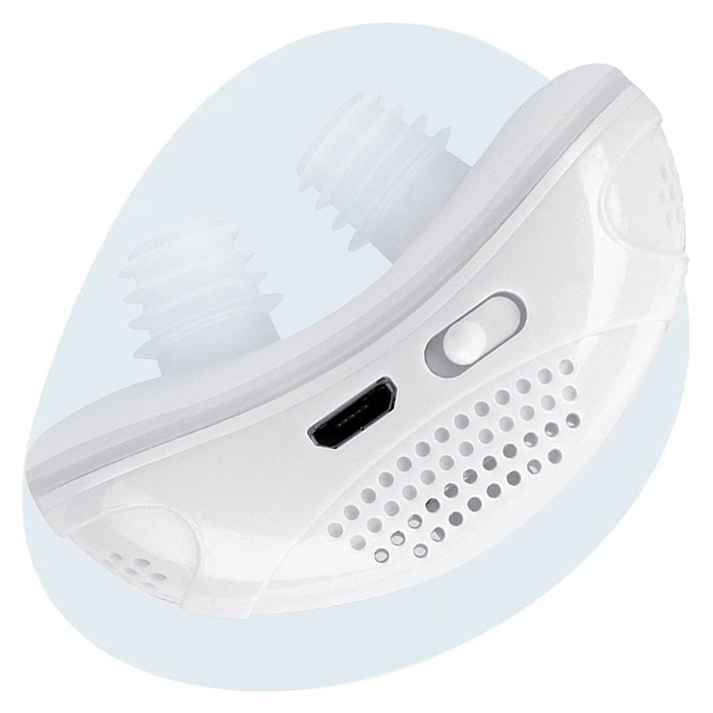 Compact CPAP machine with white nasal interface and side USB port