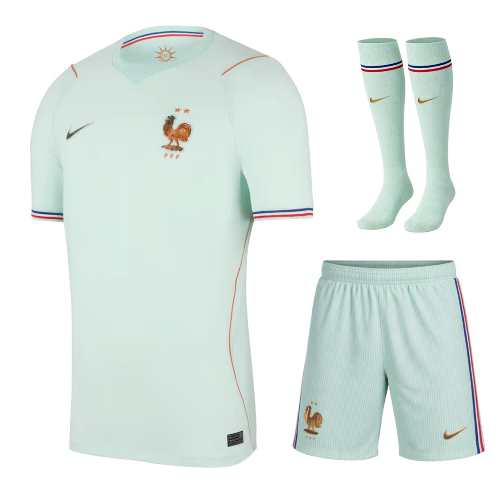 Pale green kids football kit with shirt, shorts and matching socks
