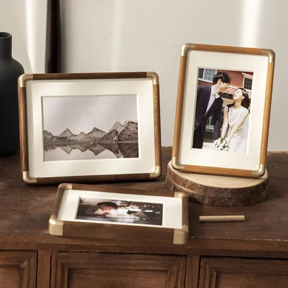 Tabletop photo frame with wood and brass-effect border