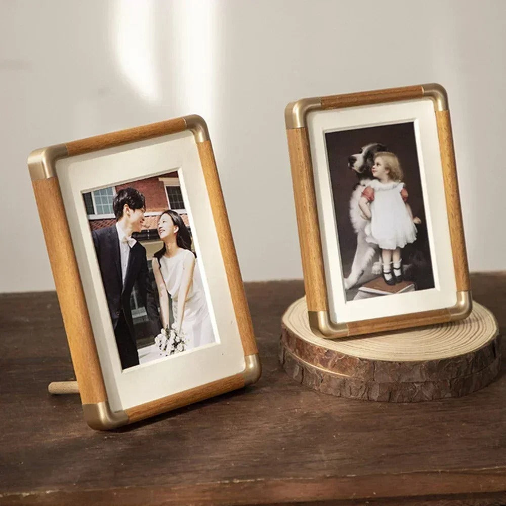 Tabletop photo frame with wood and brass-effect border