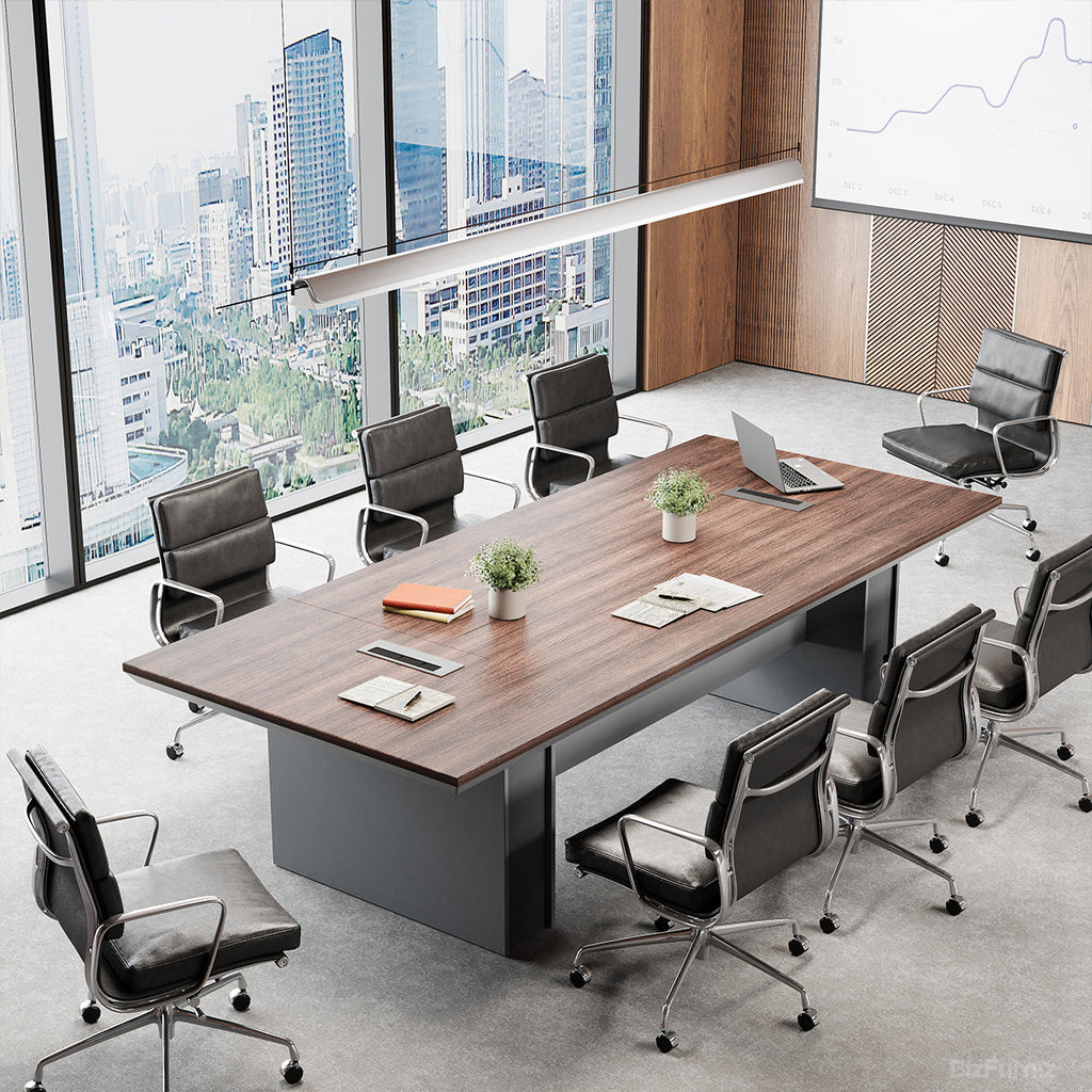 Large brown wood-effect conference table with grey base and cable management