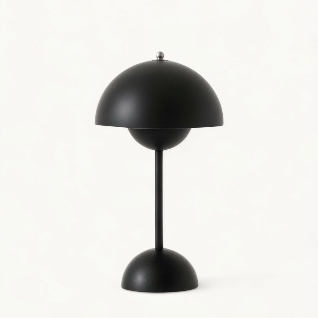 Mushroom-style table lamp with dome shade, slim stem and rounded base