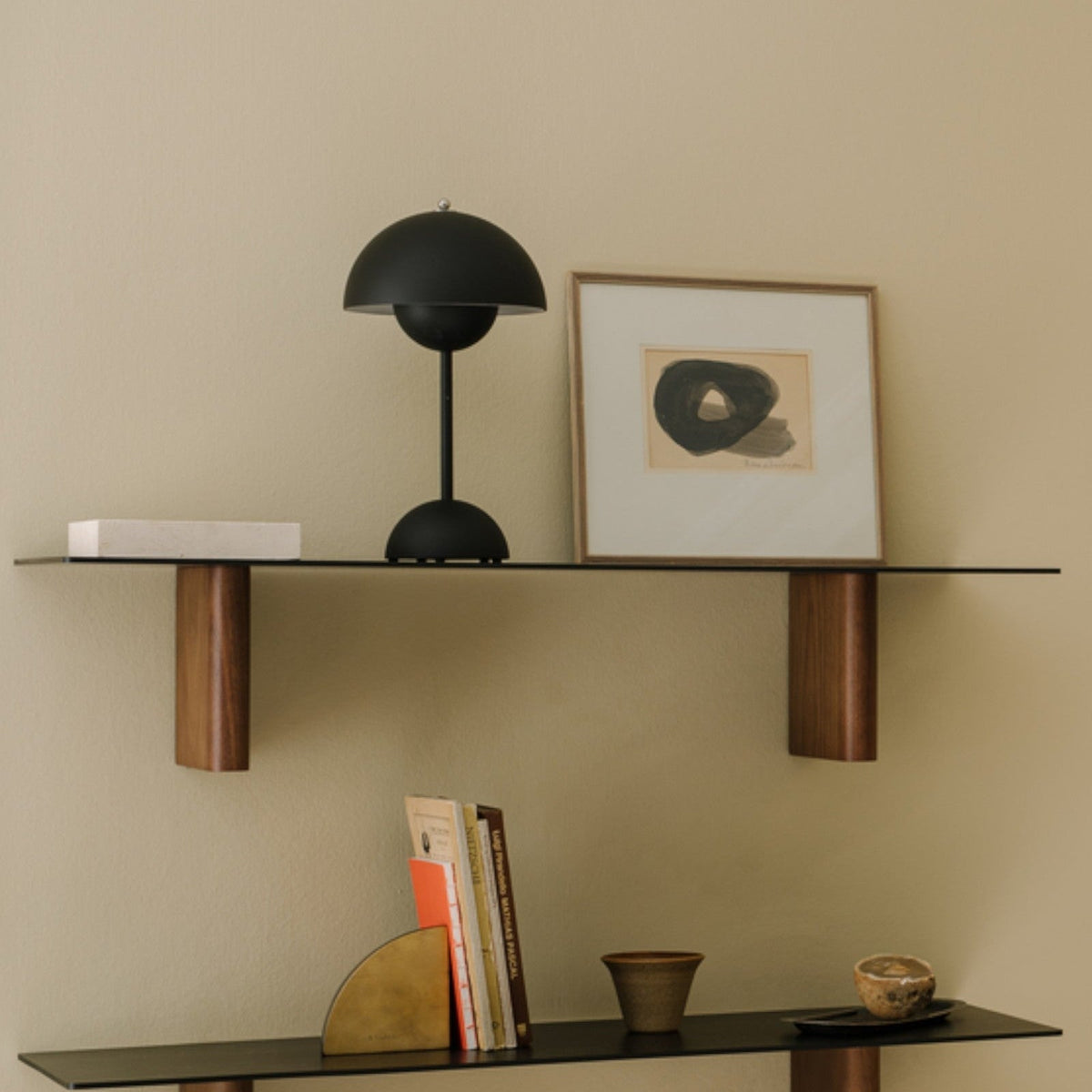 Mushroom-style table lamp with dome shade, slim stem and rounded base