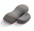 Grey 3-in-1 neck massage pillow with orange trim and padded side supports