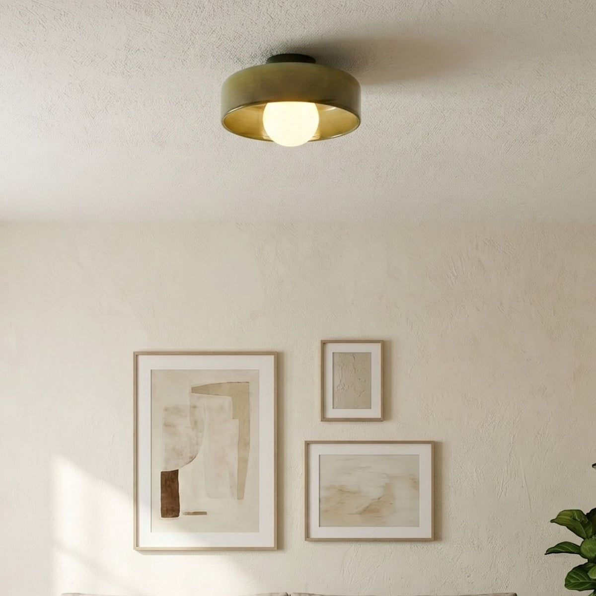 Rounded glass flush ceiling light with central white spherical diffuser