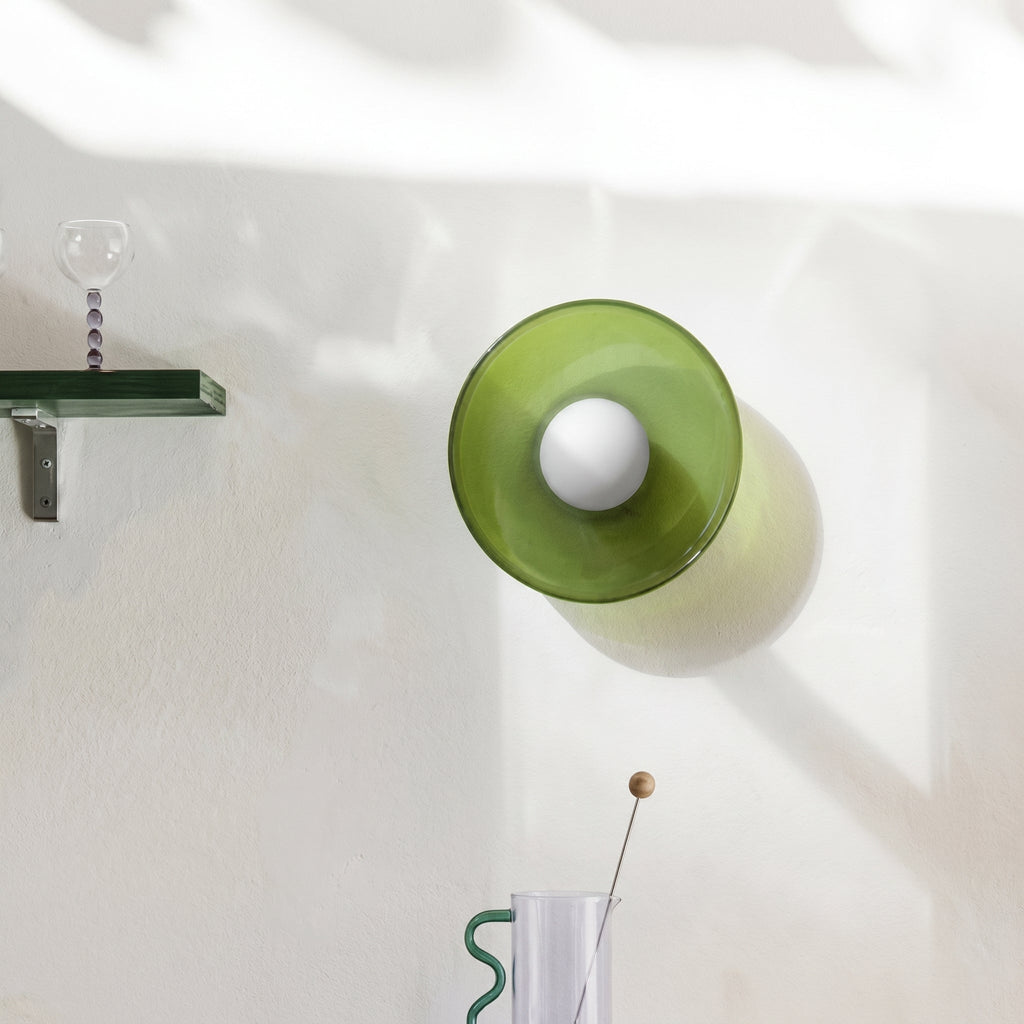 Rounded glass flush ceiling light with central white spherical diffuser