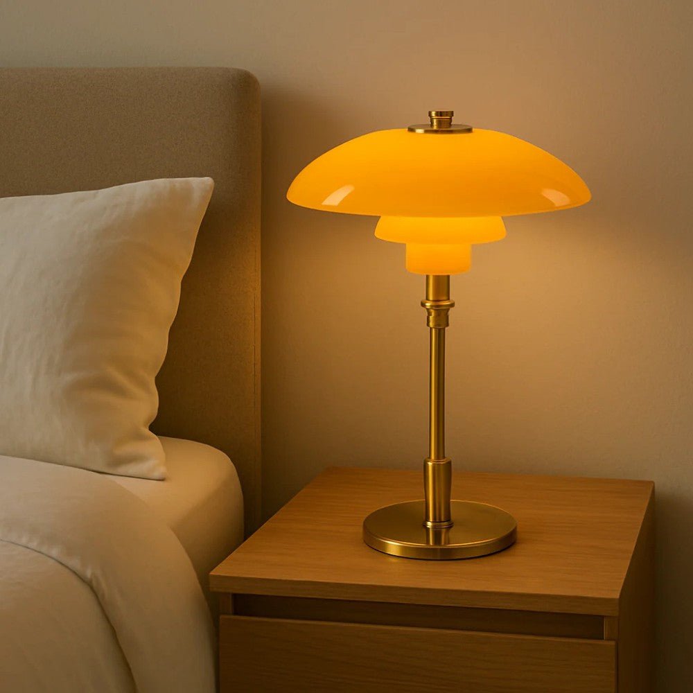 Layered glass table lamp with dome shade, slim metal stem and round base