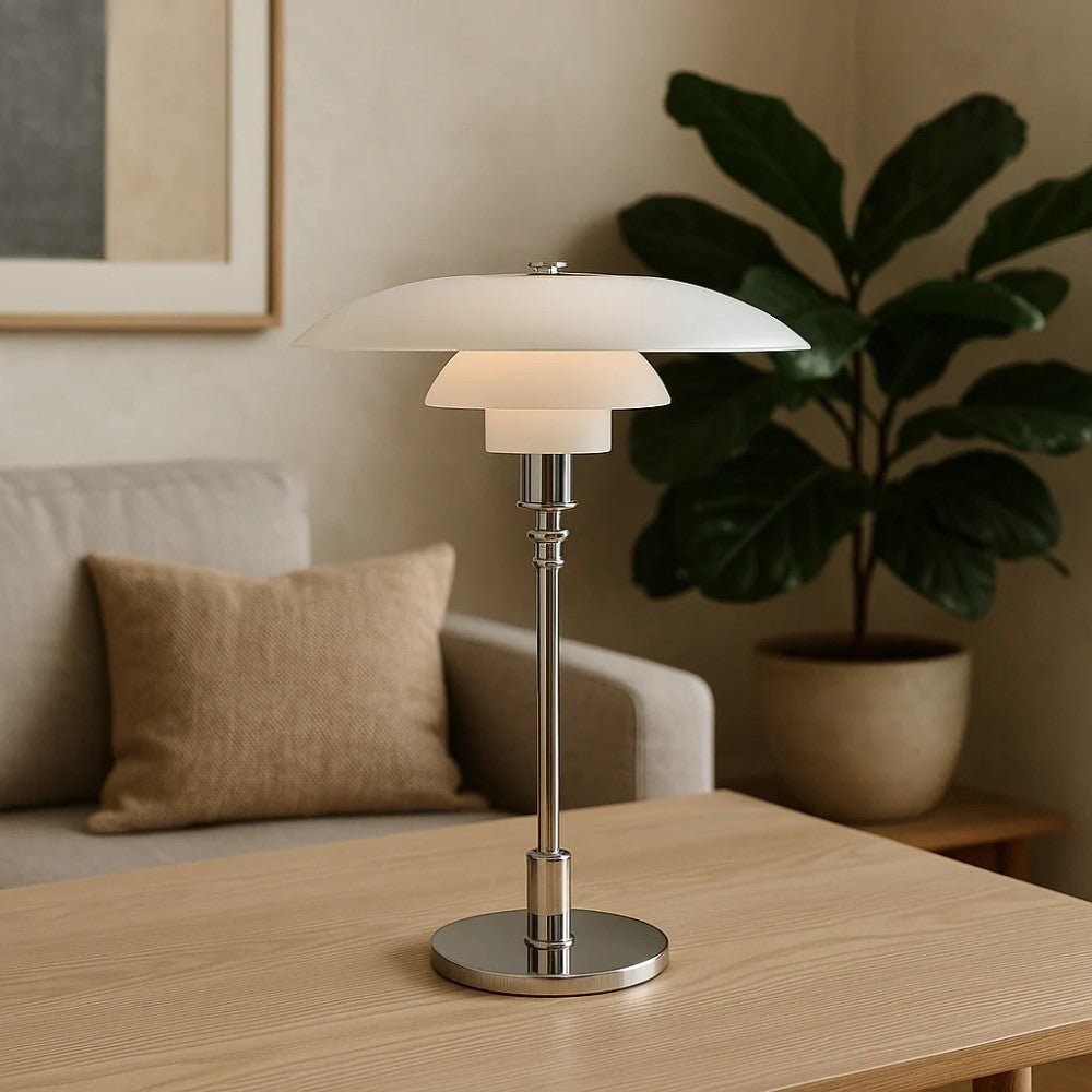 Layered glass table lamp with dome shade, slim metal stem and round base