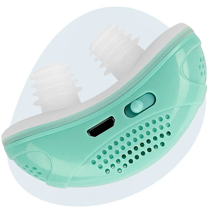 Compact CPAP machine with white nasal interface and side USB port