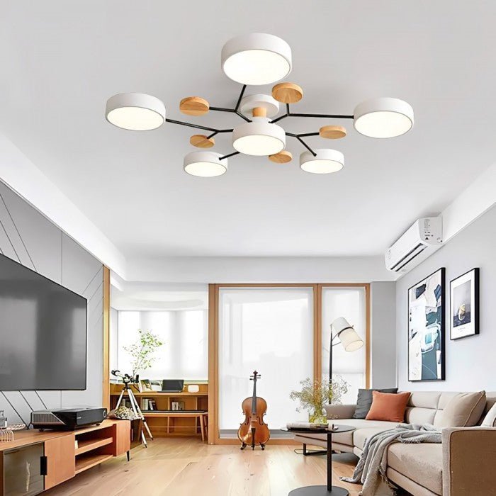 Multi-arm LED ceiling light with circular shades and decorative disc details