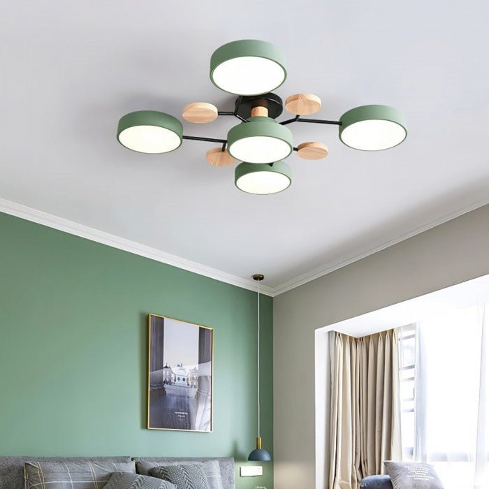Multi-arm LED ceiling light with circular shades and decorative disc details