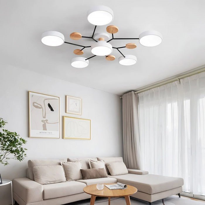 Multi-arm LED ceiling light with circular shades and decorative disc details