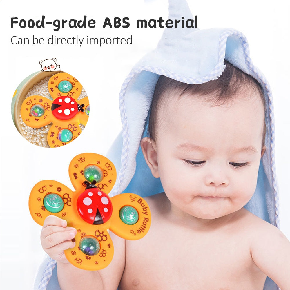 Colourful baby suction cup rattles with spinning insect designs