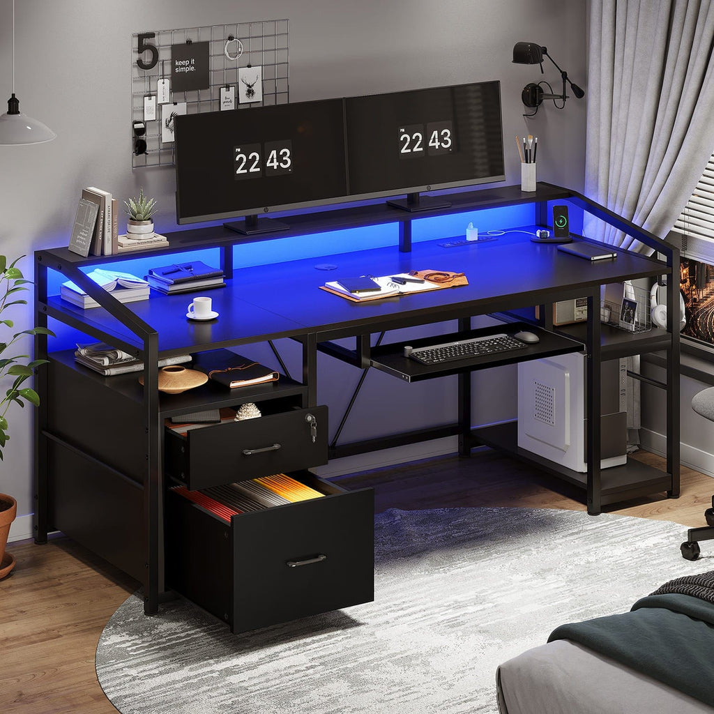 Black gaming desk with LED lighting, drawers, keyboard tray and shelves