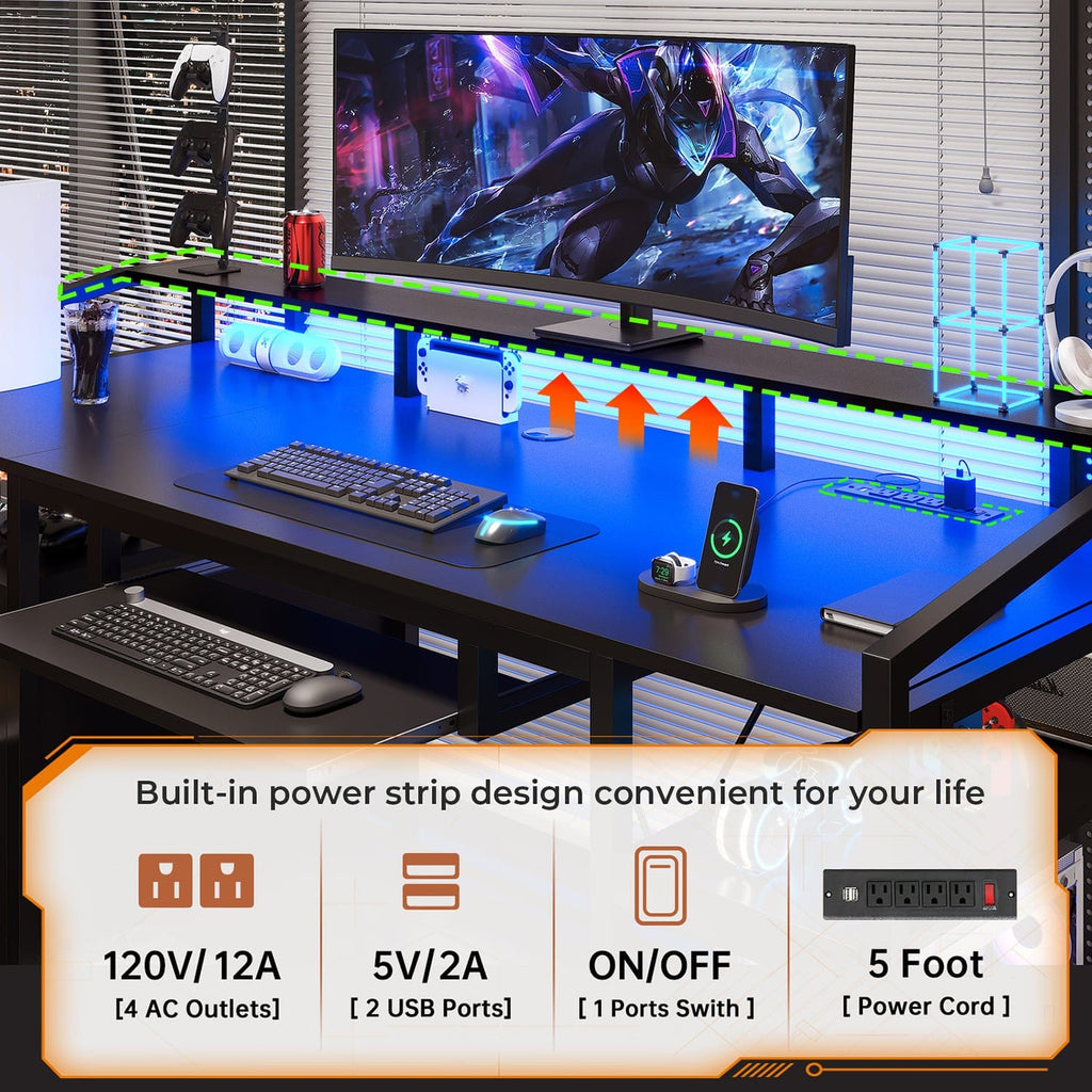 Black gaming desk with LED lighting, drawers, keyboard tray and shelves
