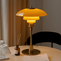 LED table lamp with layered dome shade and round base