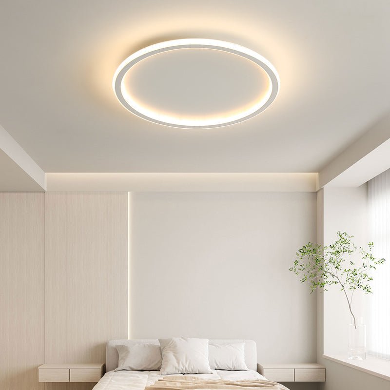 Round LED ceiling light with a slim circular illuminated ring