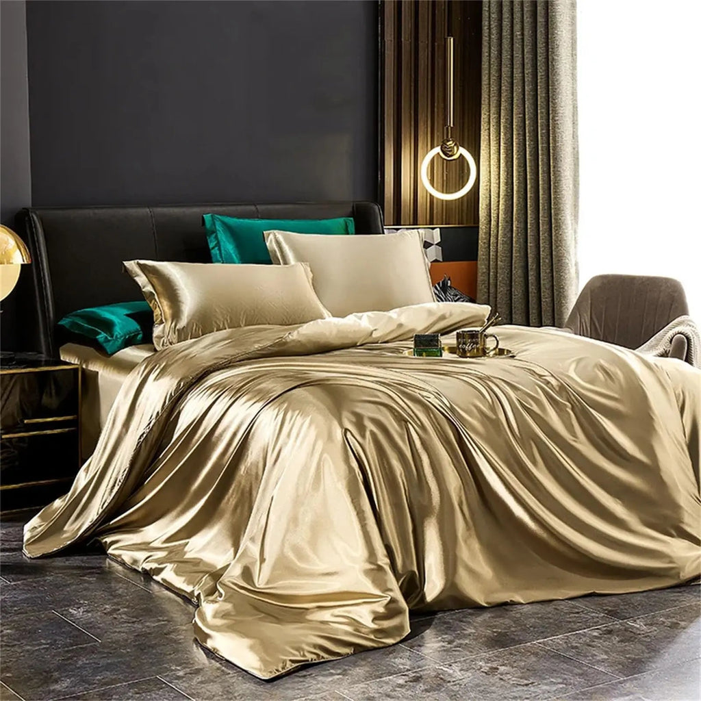 Smooth plain bedding set arranged on a bed with duvet cover, sheet and pillowcases