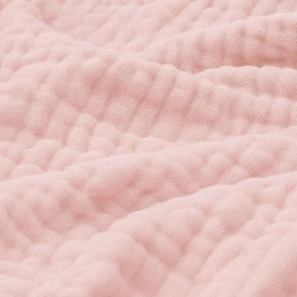 Soft textured blanket with a raised rippled surface
