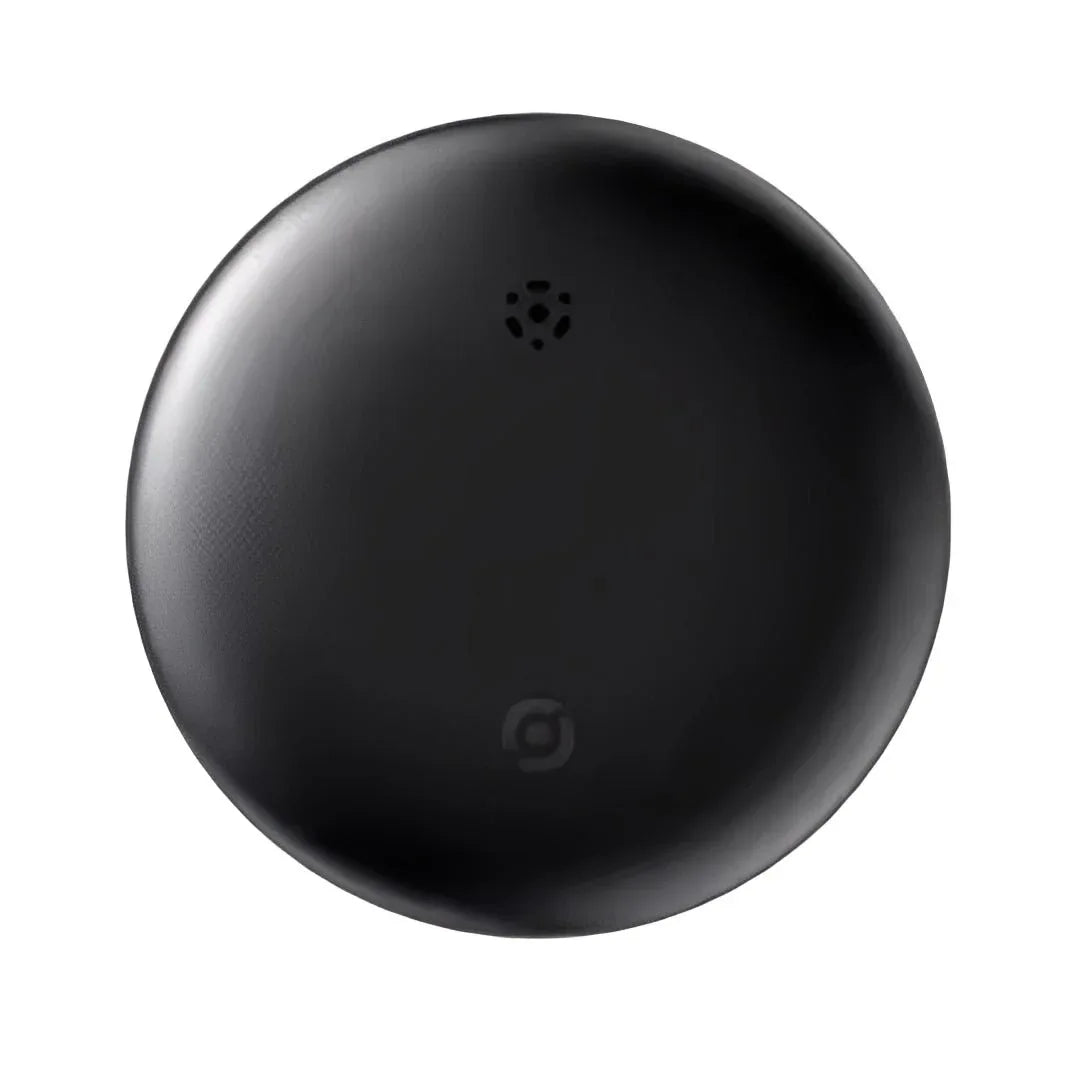 Compact round GPS tracker in white and black