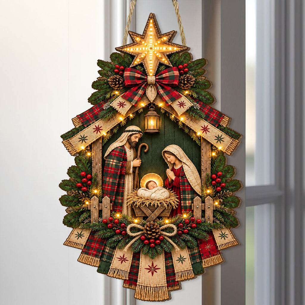 Christmas nativity door hanging decoration with star, ribbons, greenery and decorative lights