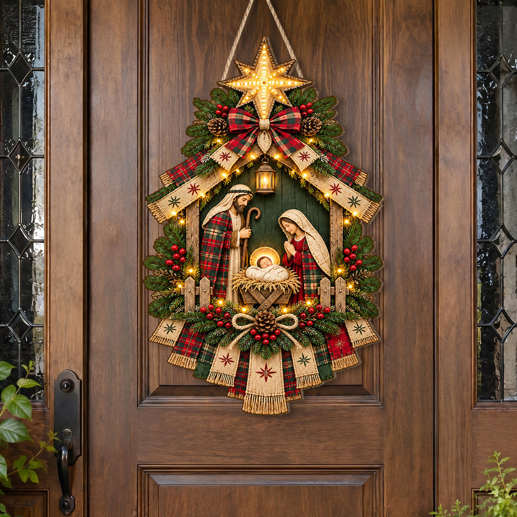Christmas nativity door hanging decoration with star, ribbons, greenery and decorative lights