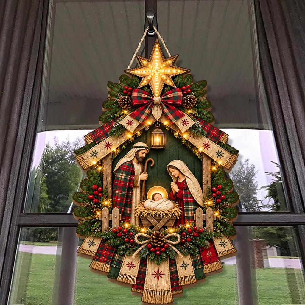 Christmas nativity door hanging decoration with star, ribbons, greenery and decorative lights