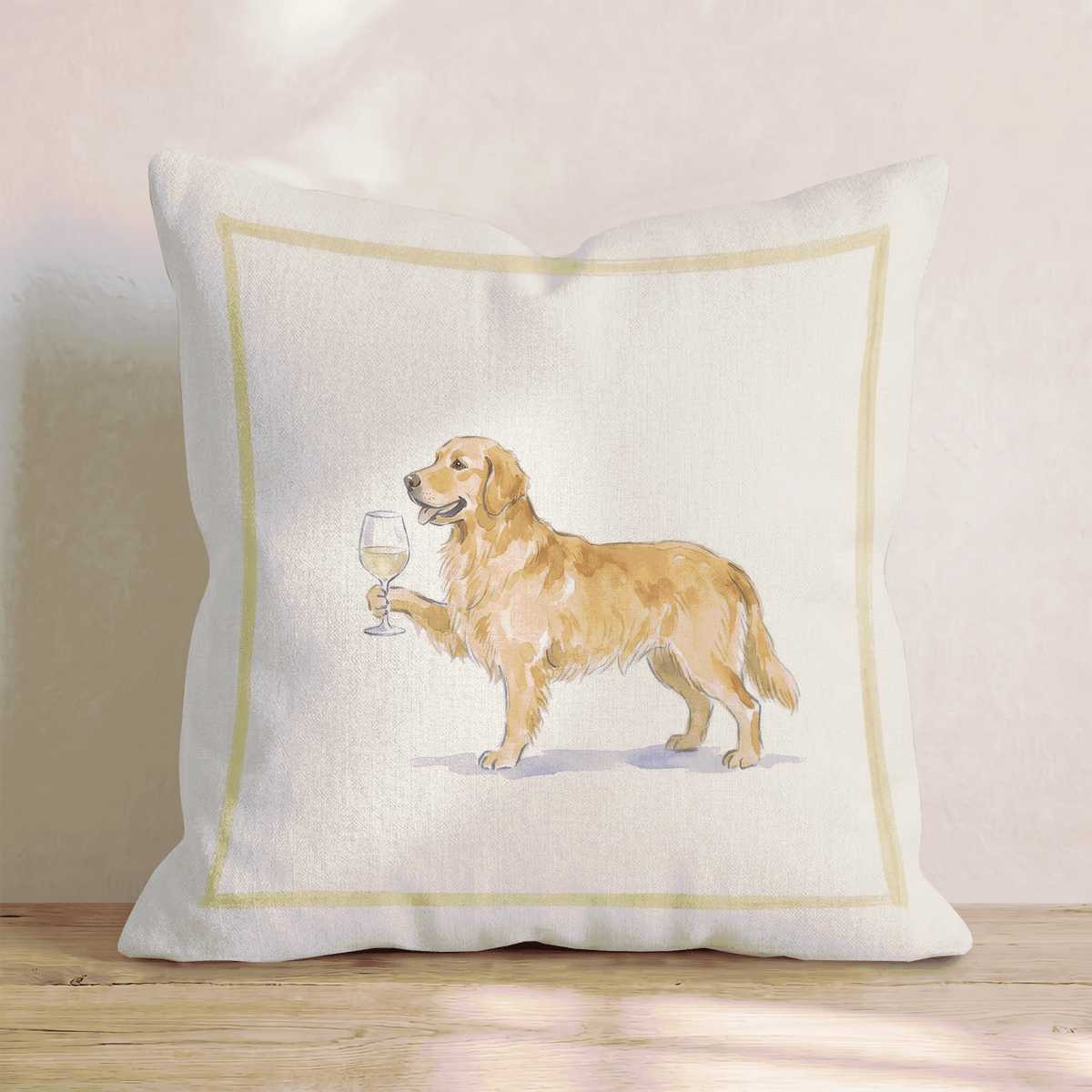 White throw pillow with a golden retriever holding a wine glass